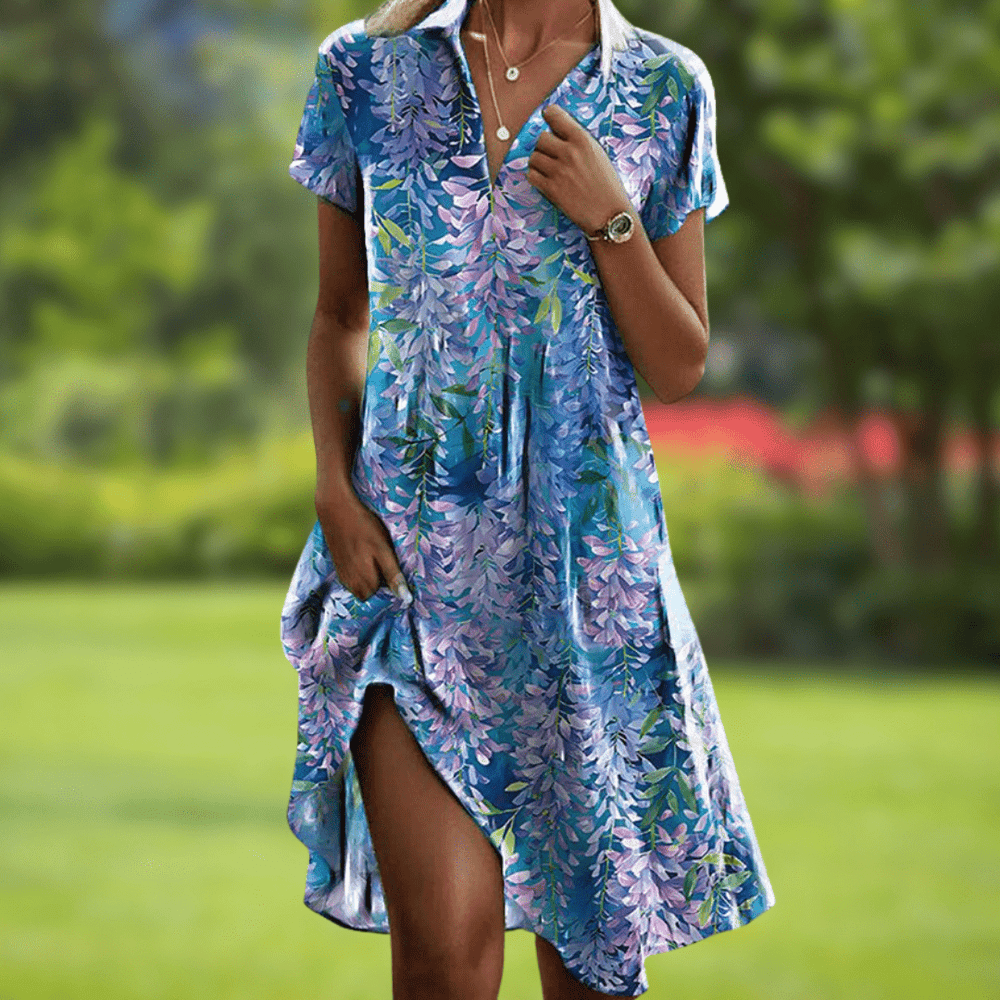 Fließendes Damen Maxikleid mit lebhaftem Blumenmuster & femininem V-Ausschnitt, perfekt als schickes Freizeit- oder Abendkleid.