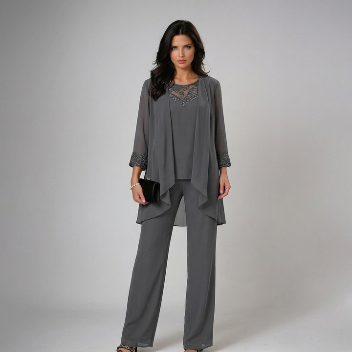 Festliches Damen Trio-Set: Weite Hose, stilvolles Top und leichter Cardigan, perfekt für Party-Outfits.