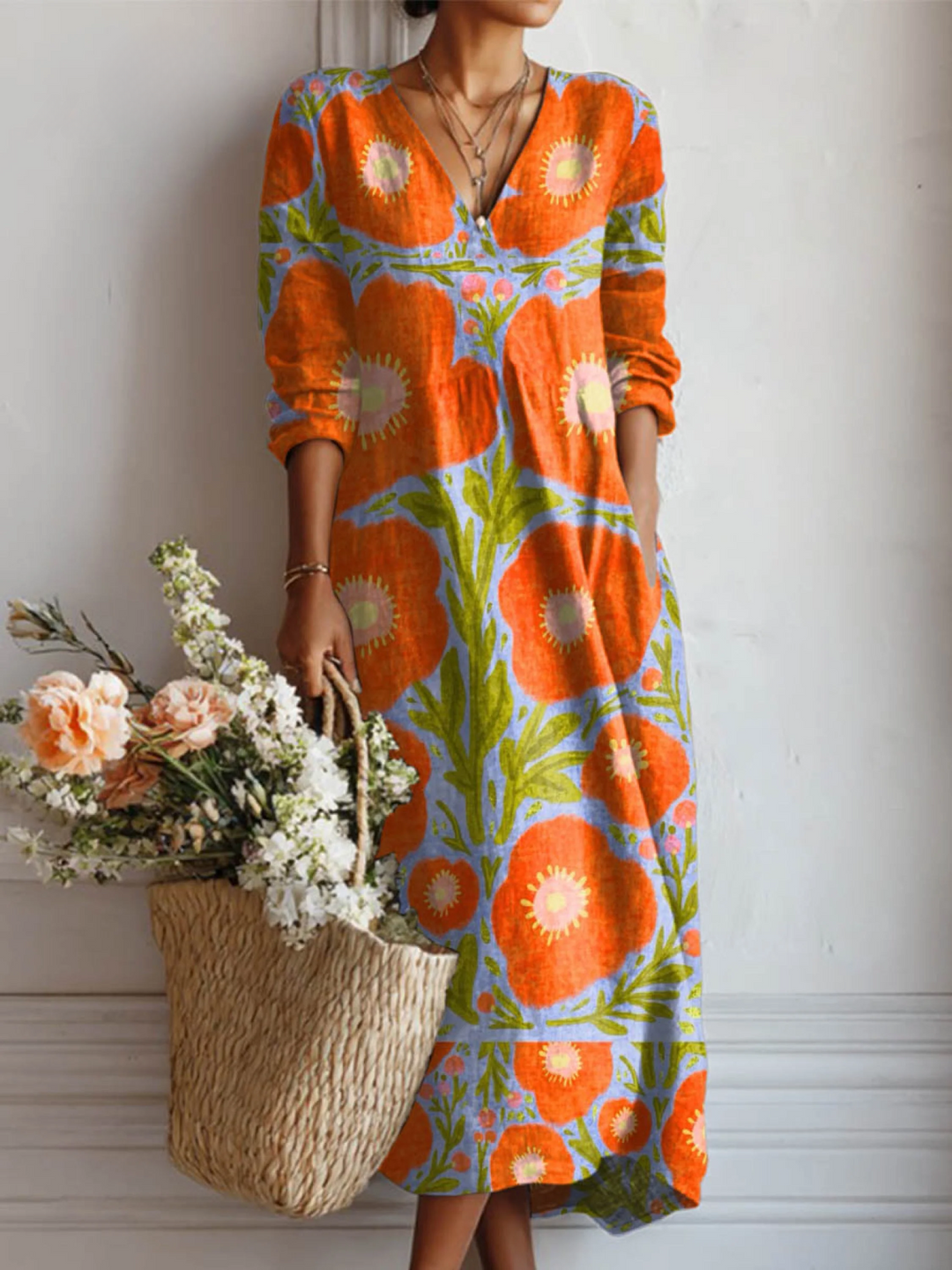 Elegantes Damen Vintage Blumen Maxikleid für den Herbst, mit langen Ärmeln und floralem Muster.