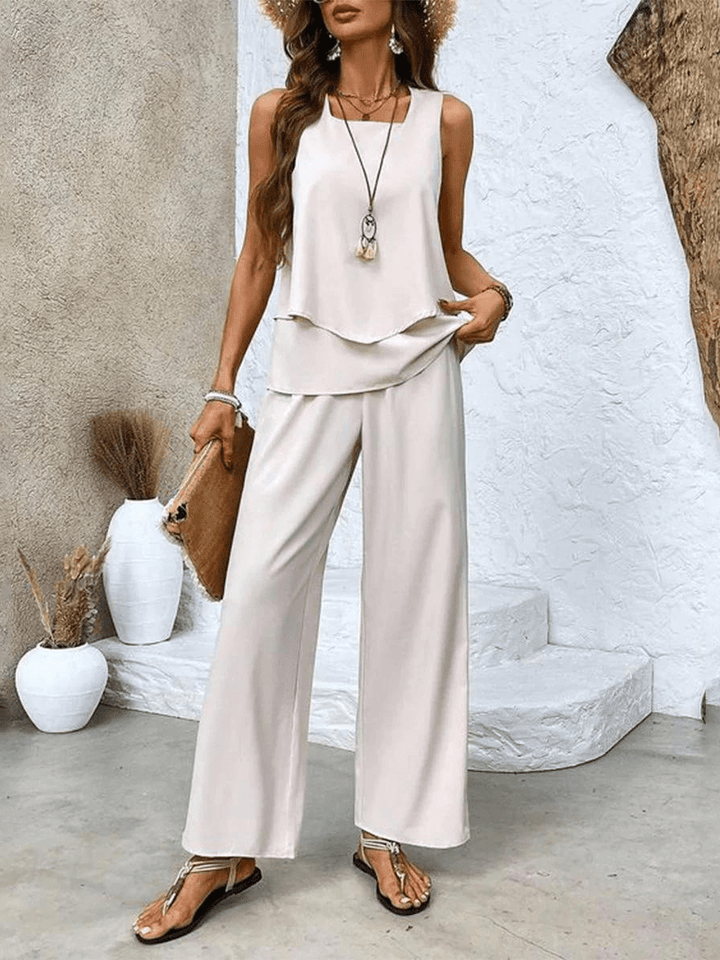 Modischer Zweiteiler für Damen: elegante Bluse und weite Hose. Perfekt für Freizeit & Business Casual.