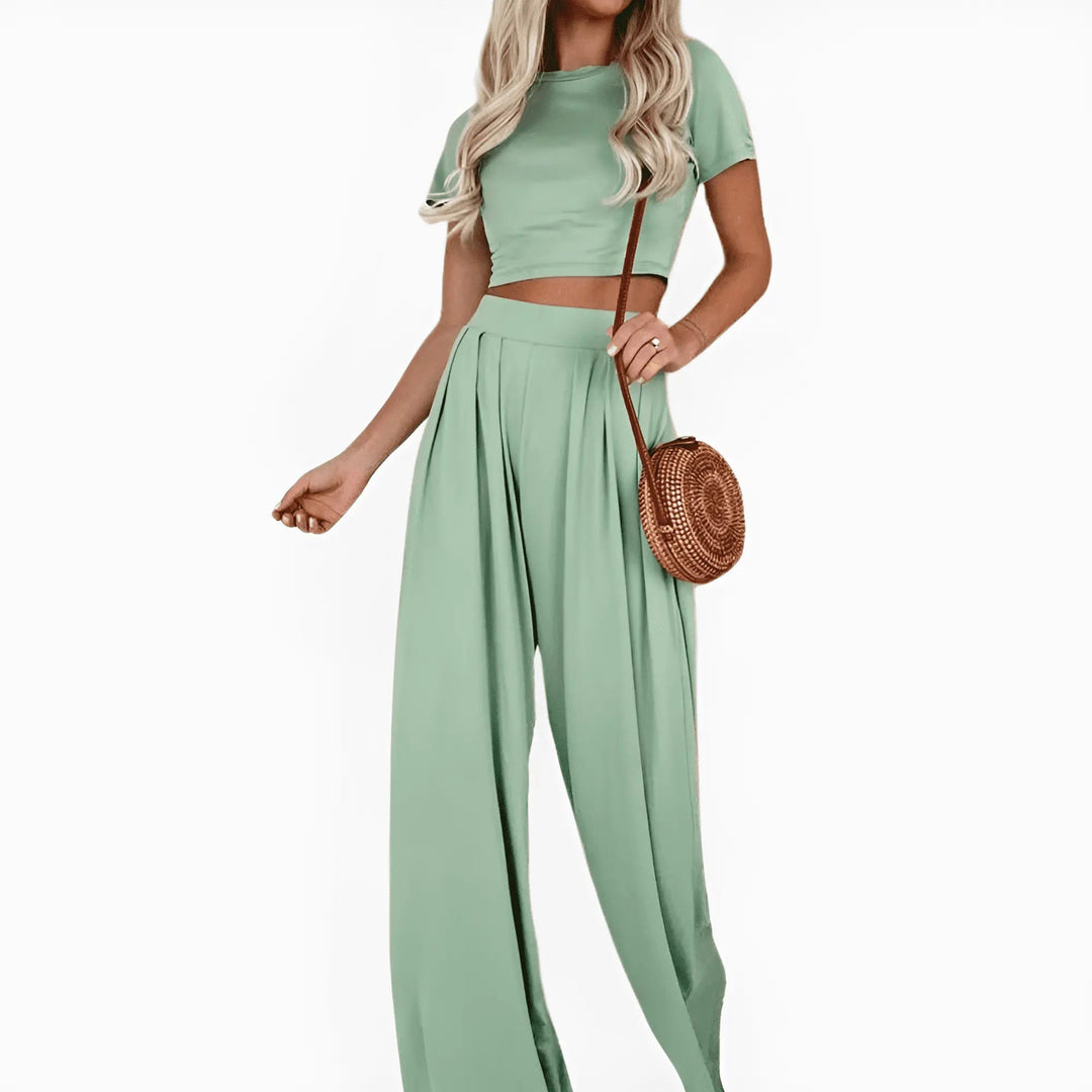 Elegantes Damen Zweiteiler Set: bequeme High-Waist Hose und leichtes Sommer-Top. Perfekt für Urlaub & Freizeit.