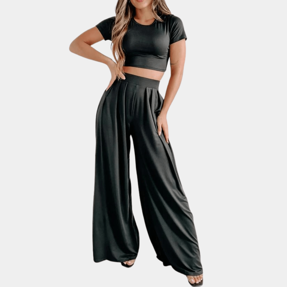 Model trägt elegantes Damen Zweiteiler Set: High-Waist Hose & Sommer-Top. Ideal für Brunch, Urlaub oder Abendmode.