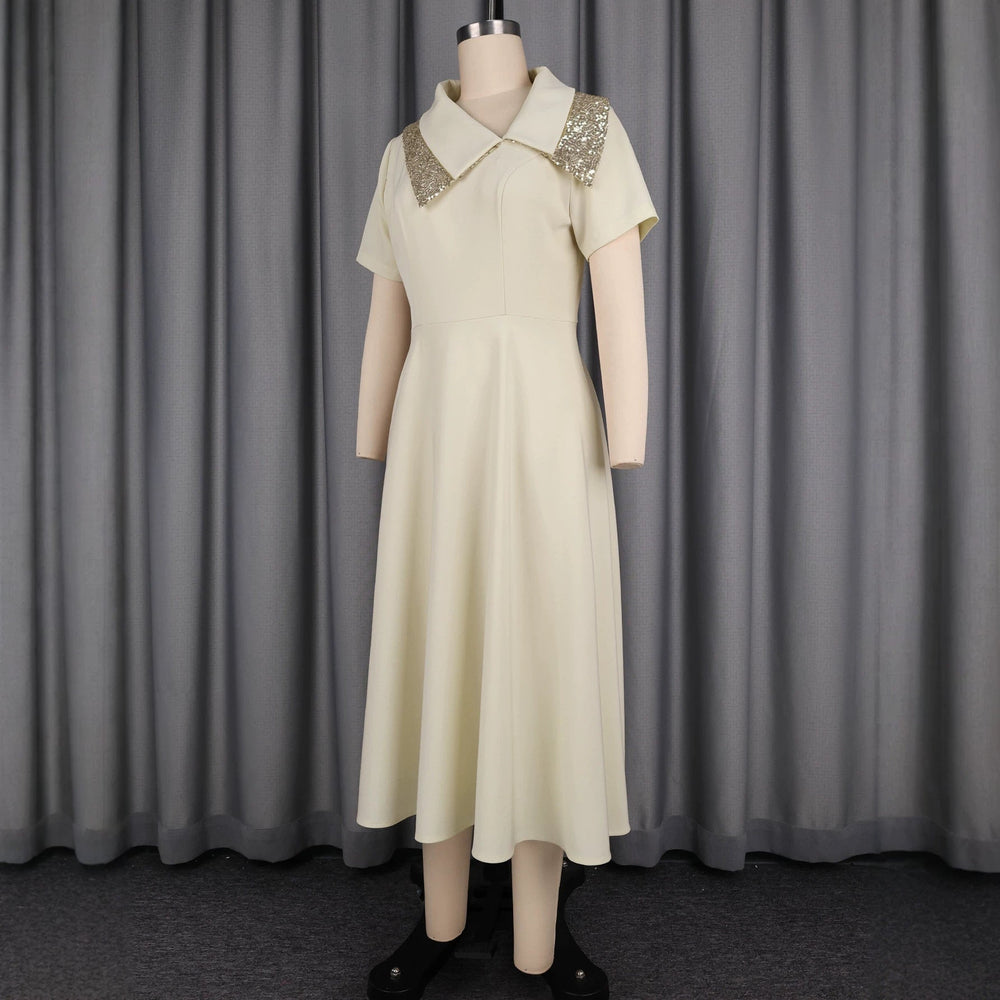 Festliches A-Linien-Kleid für Damen mit glitzerndem Paillettenkragen; ideal als Abendkleid oder Partykleid.