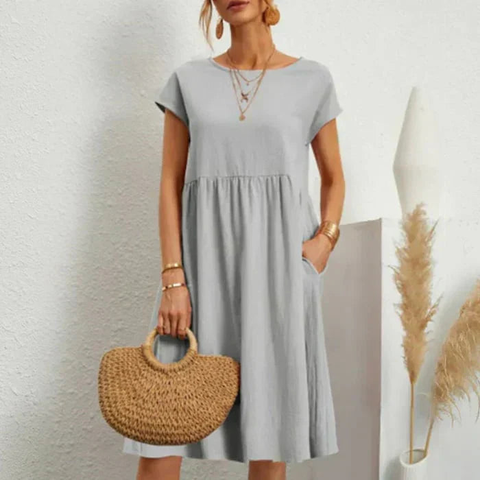 Elegantes Damenkleid mit Rundhalsausschnitt. Zeitloses Kurzarm-Freizeitkleid für Frühling & Sommer.