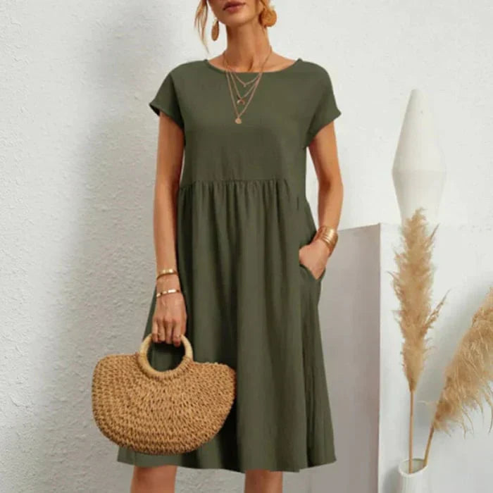 Zeitloses Damenkleid mit Rundhalsausschnitt. Vielseitiges, modisches Sommer- & Freizeitkleid für Frauen.
