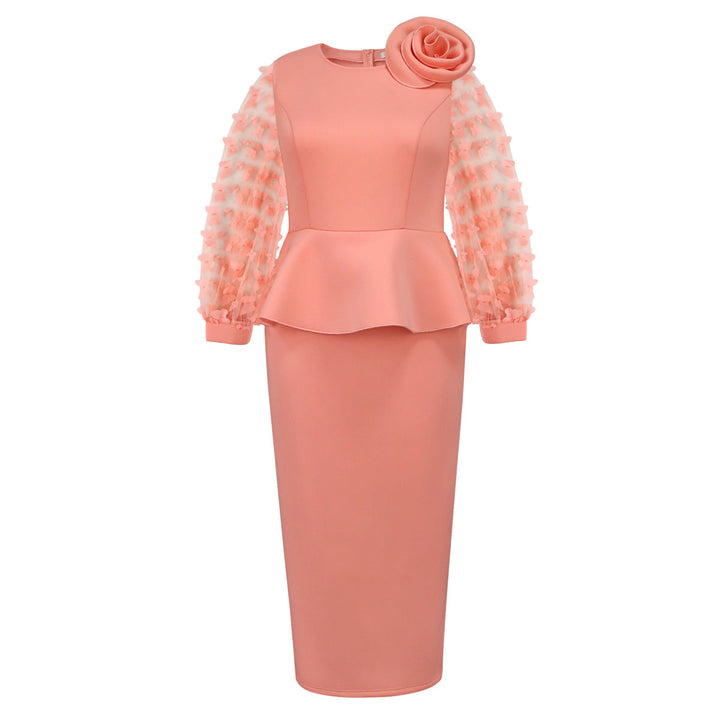 Modernes, elegantes Damenkleid mit voluminösen Puffärmeln und wunderschönem floralem Design für eine schmeichelnde Silhouette.
