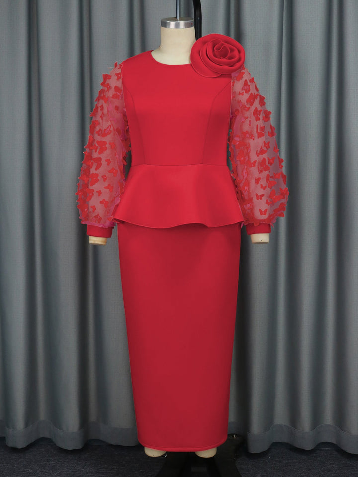 Stilvolles Damen Abendkleid mit Puffärmeln und elegantem floralen Muster. Ein Statement-Kleid für Frauenmode.