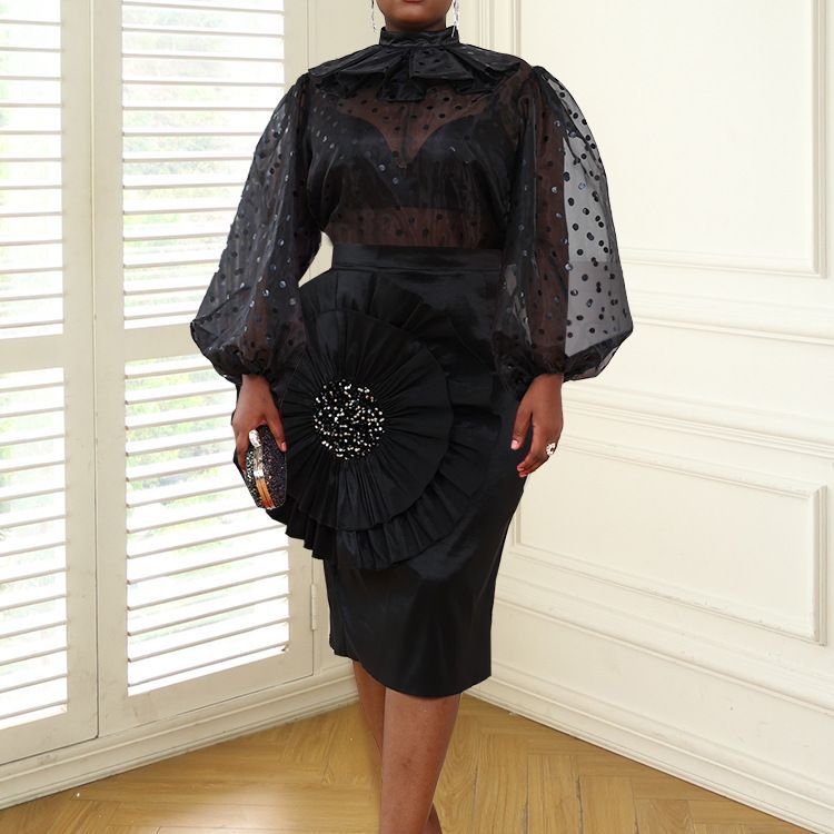Elegantes Damenkleid mit transparenten Puffärmeln, Rüschen, ideal für festliche Anlässe.