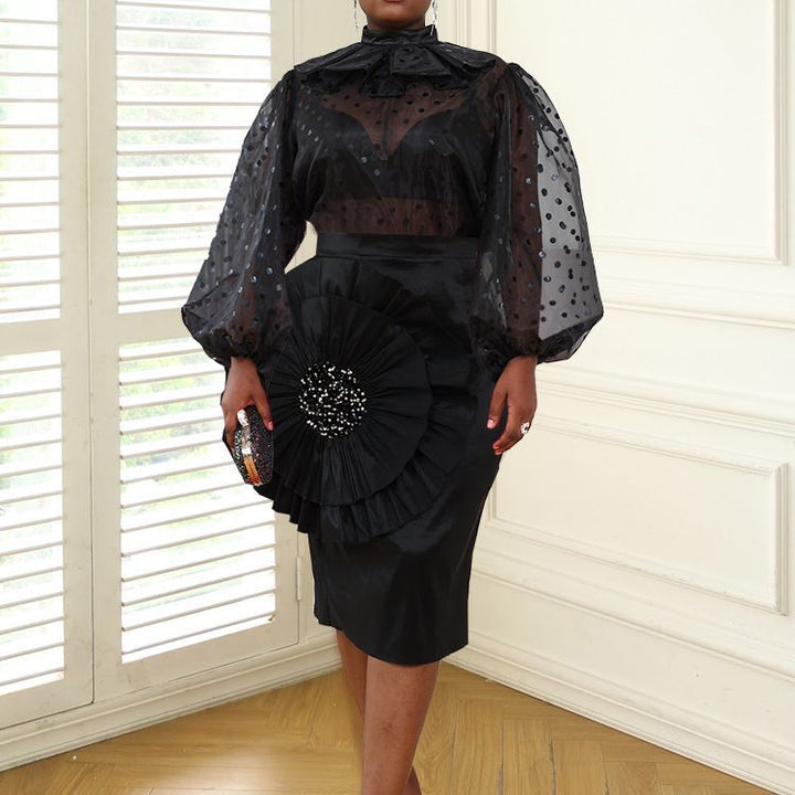 Elegantes Damenkleid mit transparenten Puffärmeln, Rüschen, ideal für festliche Anlässe.