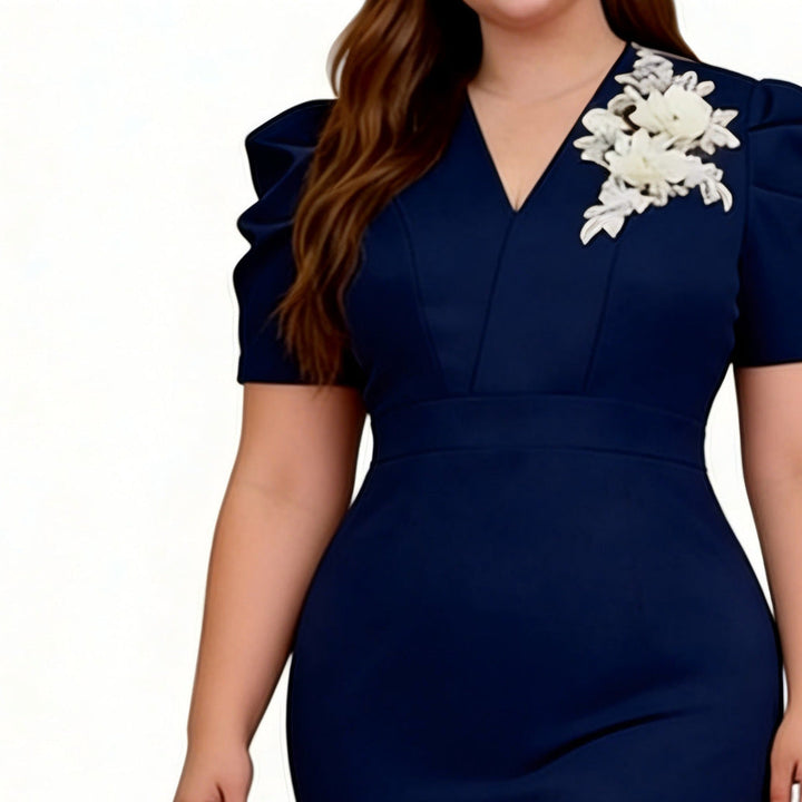 Elegantes Damen-Cocktailkleid in Dunkelblau mit Puffärmeln, V-Ausschnitt und Meerjungfrau-Saum. Ideal für Feiern.