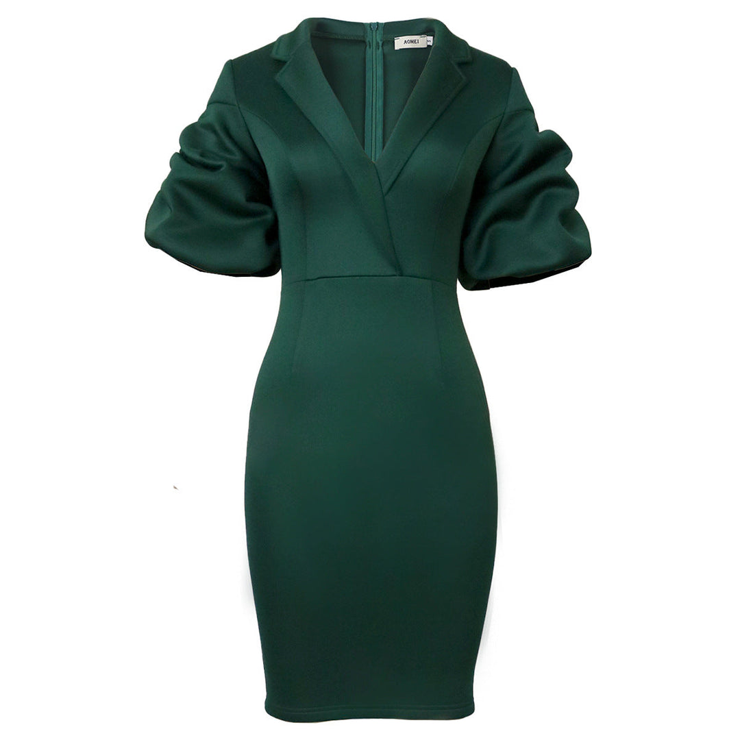 Schickes Abendkleid in Schwarzgrün für Damen. Figurbetonte Passform mit stilvollen Puffärmeln, perfekt für Feste.