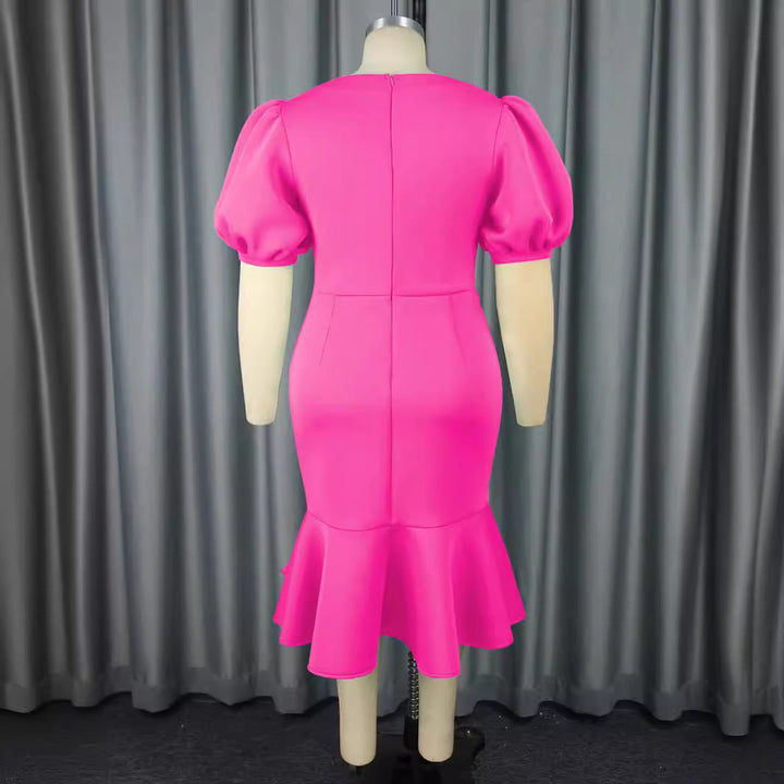 Stilvolles Damen Partykleid mit Puffärmeln, figurbetontem Schnitt und femininem Rüschensaum. Ideal für Sommer.