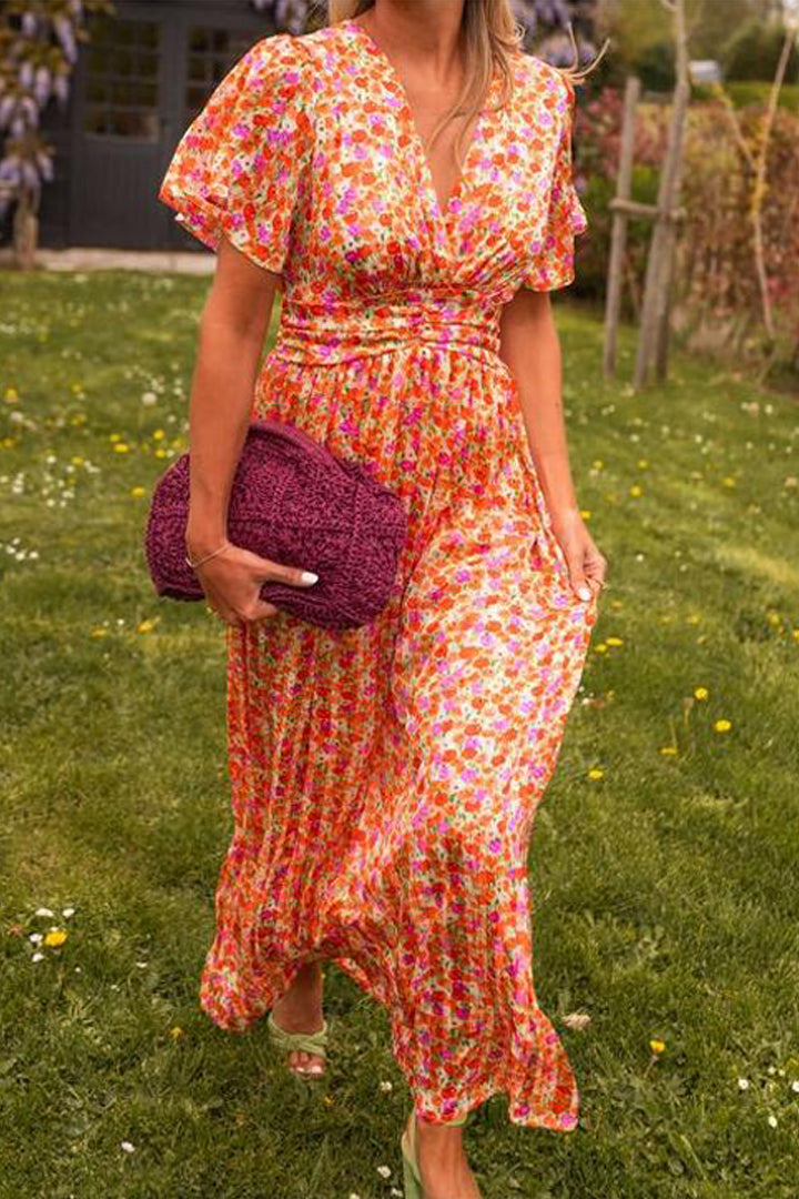 Elegantes florales Maxikleid Lyra für Damen. Leichtes Sommerkleid mit Blumenmuster für Freizeit & Urlaub.
