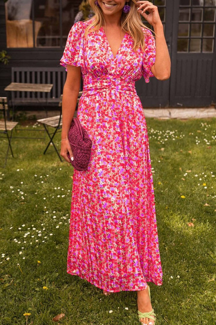 Fließendes Damen Maxikleid Lyra mit floralem Print. Komfortables Freizeit- & Partykleid für warme Sommertage.