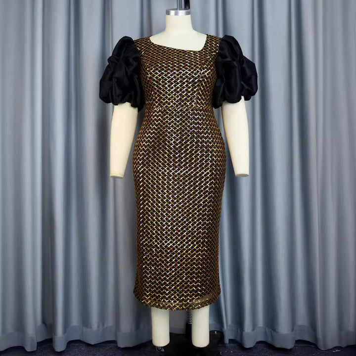 Glamouröses goldenes Partykleid für Damen mit glitzerndem Netzstoff und Puffärmeln; perfekt für festliche Abende.