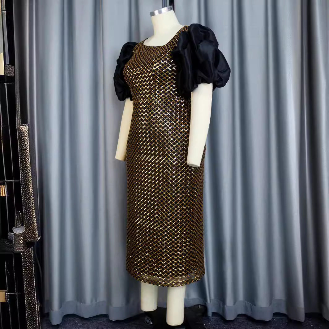 Schimmerndes goldenes Damen-Glitzerkleid mit eleganten Puffärmeln und transparentem Netzdesign für glamouröse Events.