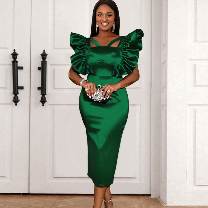 Elegantes grünes Damen-Midikleid mit voluminösen Puffärmeln, ideal für Abend- und Partyanlässe.