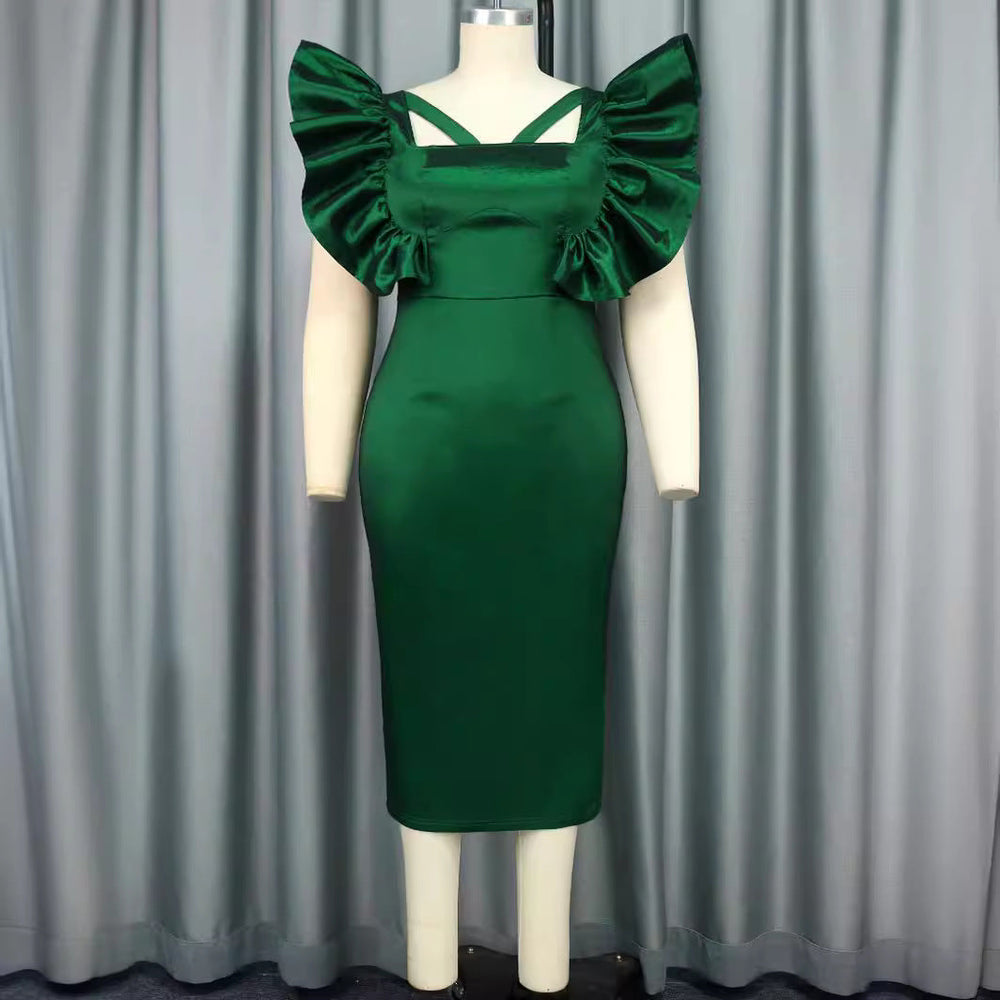 Festliches grünes Midikleid für Damen mit eleganten, voluminösen Puffärmeln, perfekt für besondere Anlässe.