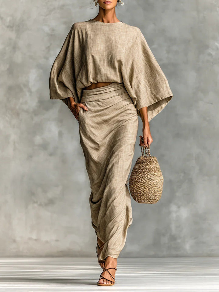 Elegantes Khaki Damen Set mit lockerem Batwing Oberteil und passendem Maxirock. Ideal für Frühling/Sommer Freizeit.