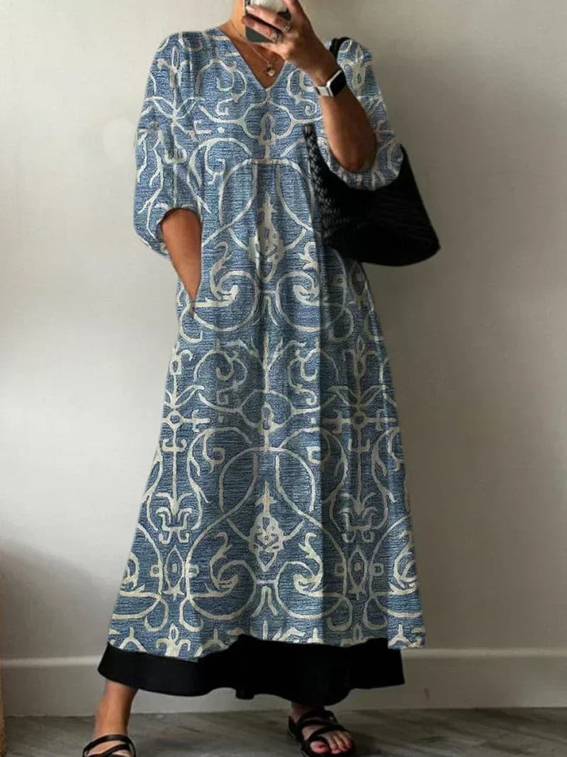 Elegantes, leichtes Damen Blumenkleid Lia mit floralem Muster. Modisches Maxikleid im Boho-Stil für den Sommer.