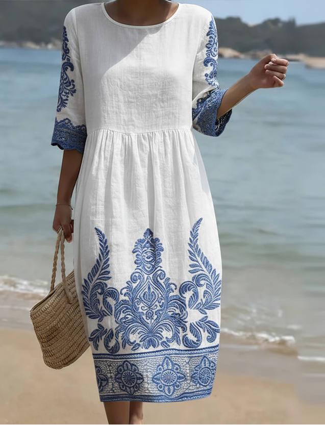 Elegantes, leichtes weißes Damen Midikleid mit Blumenmuster, ideal als Sommer- oder Freizeitkleid.