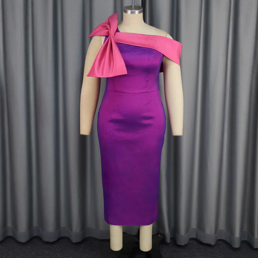 Stilvolles Partykleid für Damen in Lila, figurbetont, mit modernen asymmetrischen Rüschen für einen eleganten Look.