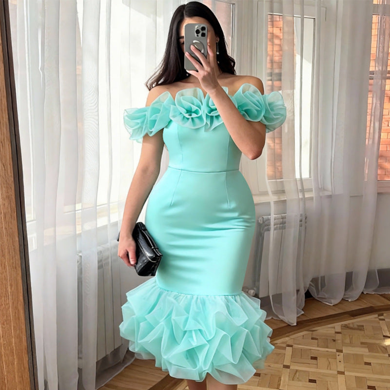 Elegantes mintgrünes figurbetontes Damenkleid mit Rüschenärmeln & voluminösem Saum. Perfekt für festliche Anlässe.