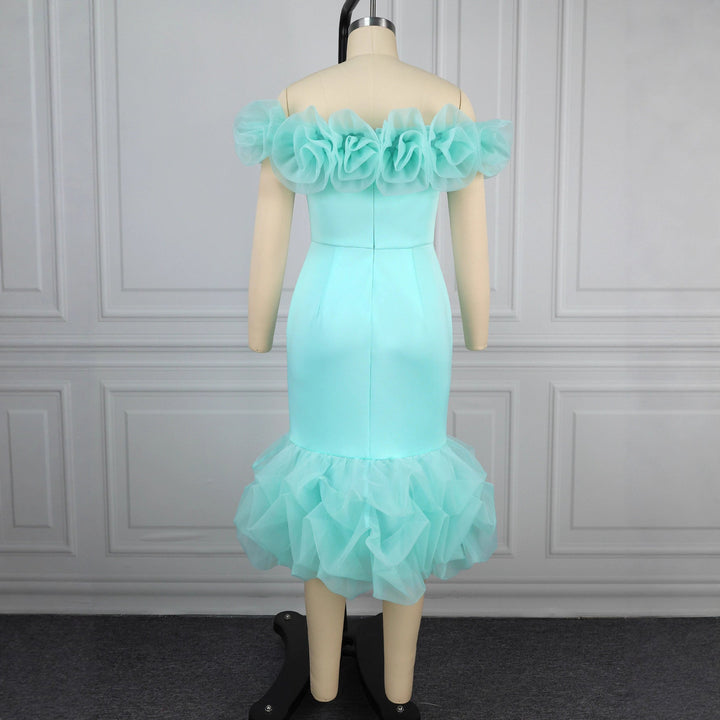 Festliches, figurbetontes Damen-Abendkleid in Mintgrün mit Rüschenärmeln & voluminösem Saum. Für elegante Anlässe.