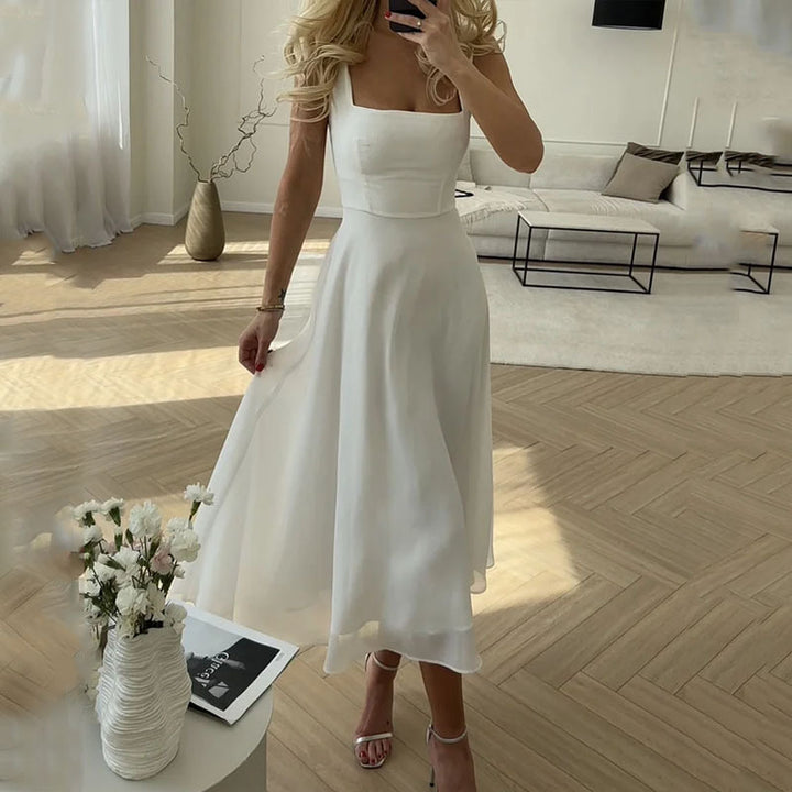 Elegantes, ärmelloses Damen-Sommerkleid. Klassisches, unifarbenes Frauenkleid, perfekt für Freizeit & Party. Sommerliche Mode.