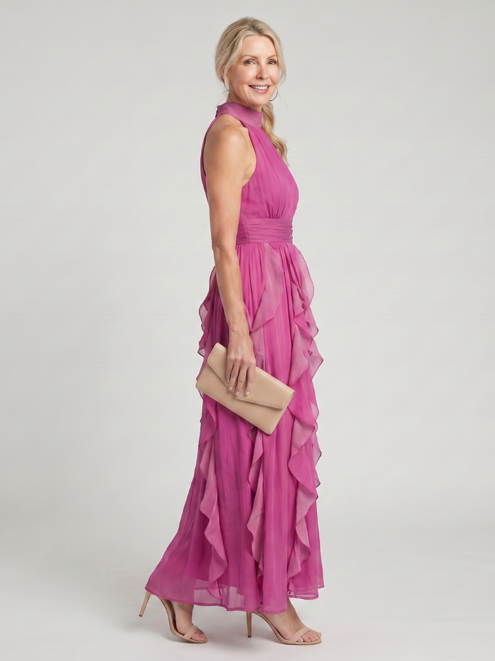 Stylisches ärmelloses Damen Maxikleid Orea in Pink, mit hohem Kragen und raffinierten Rüschen. Ideal für festliche Anlässe.