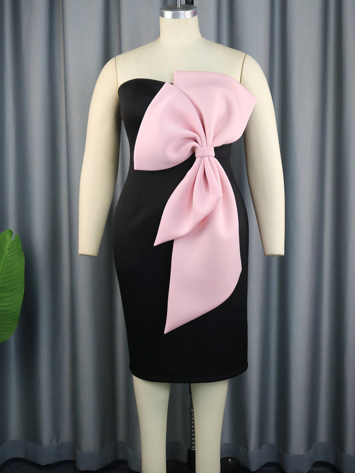 Damen Cocktailkleid, rosa Wickelstil, elegant schulterfrei mit großer Schleife; perfekt für festliche Events & Mode.