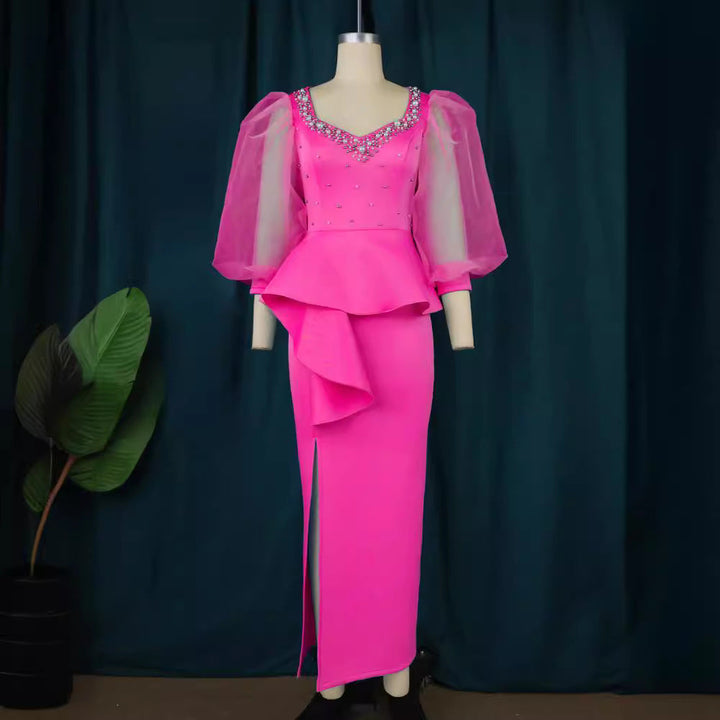 Elegantes schwarzes Partykleid für Damen mit Perlen und voluminösen Tüllärmeln. Ideal als Galakleid oder Cocktailkleid.