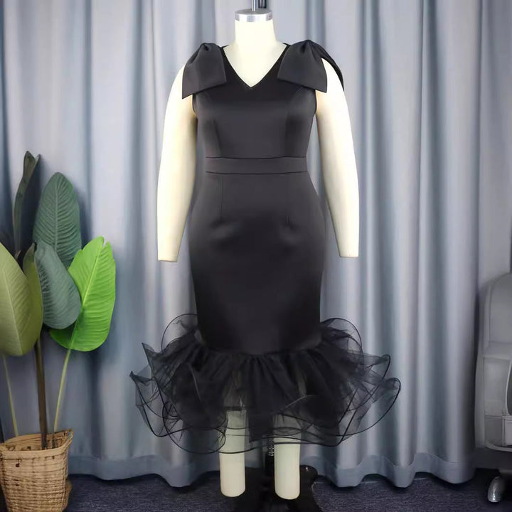 Figurbetontes Damen Partydress mit langen Ärmeln, exquisiten Tüllrüschen & glamouröser Silhouette.