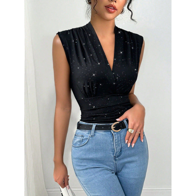 Schwarzes Langarm-Wickeloberteil für Damen mit dezenten Glitzer-Akzenten, elegant und vielseitig kombinierbar.