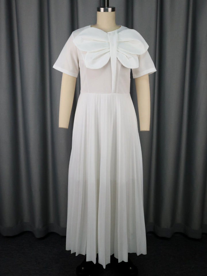 Klassisches Cocktailkleid für Damen, plissiert, mit auffälligem Schleifendetail für einen schicken Look.