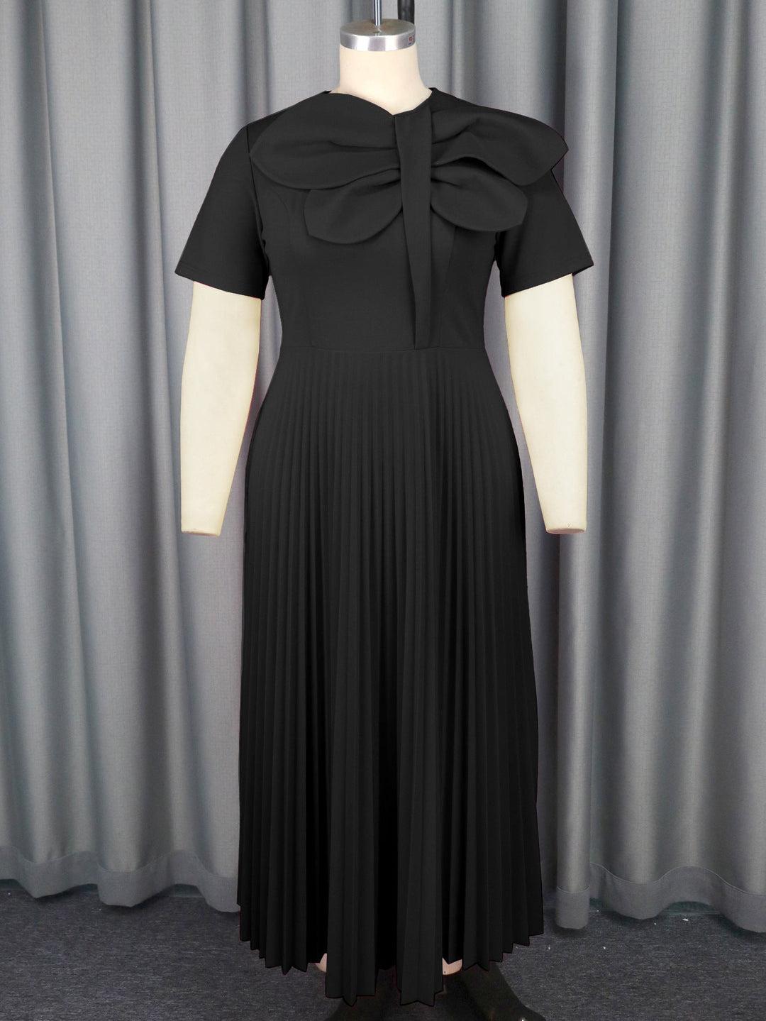 Edles schwarzes Midikleid für Damen mit eleganter Schleife, ideal für offizielle Anlässe & Abendveranstaltungen.