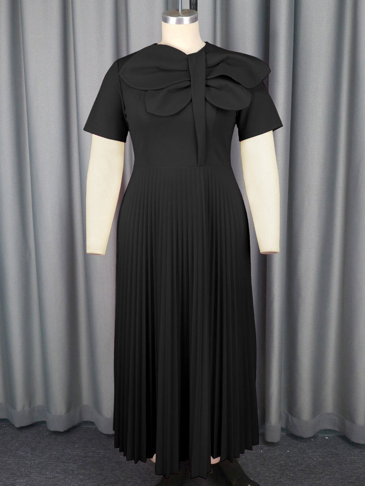 Edles schwarzes Midikleid für Damen mit eleganter Schleife, ideal für offizielle Anlässe & Abendveranstaltungen.