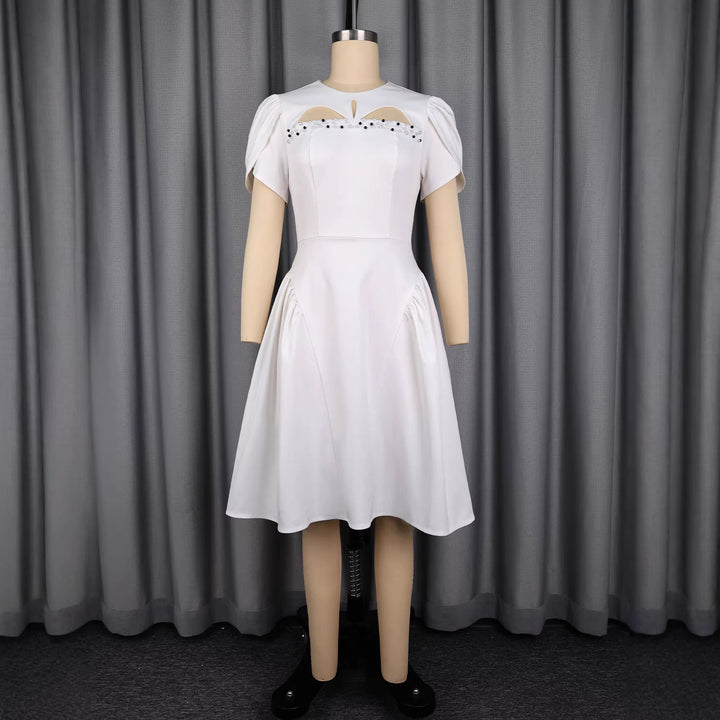 Modisches Partykleid für Damen, weiß, mit stilvollen Cut-Outs und Puffärmeln, perfekt für festliche Events.