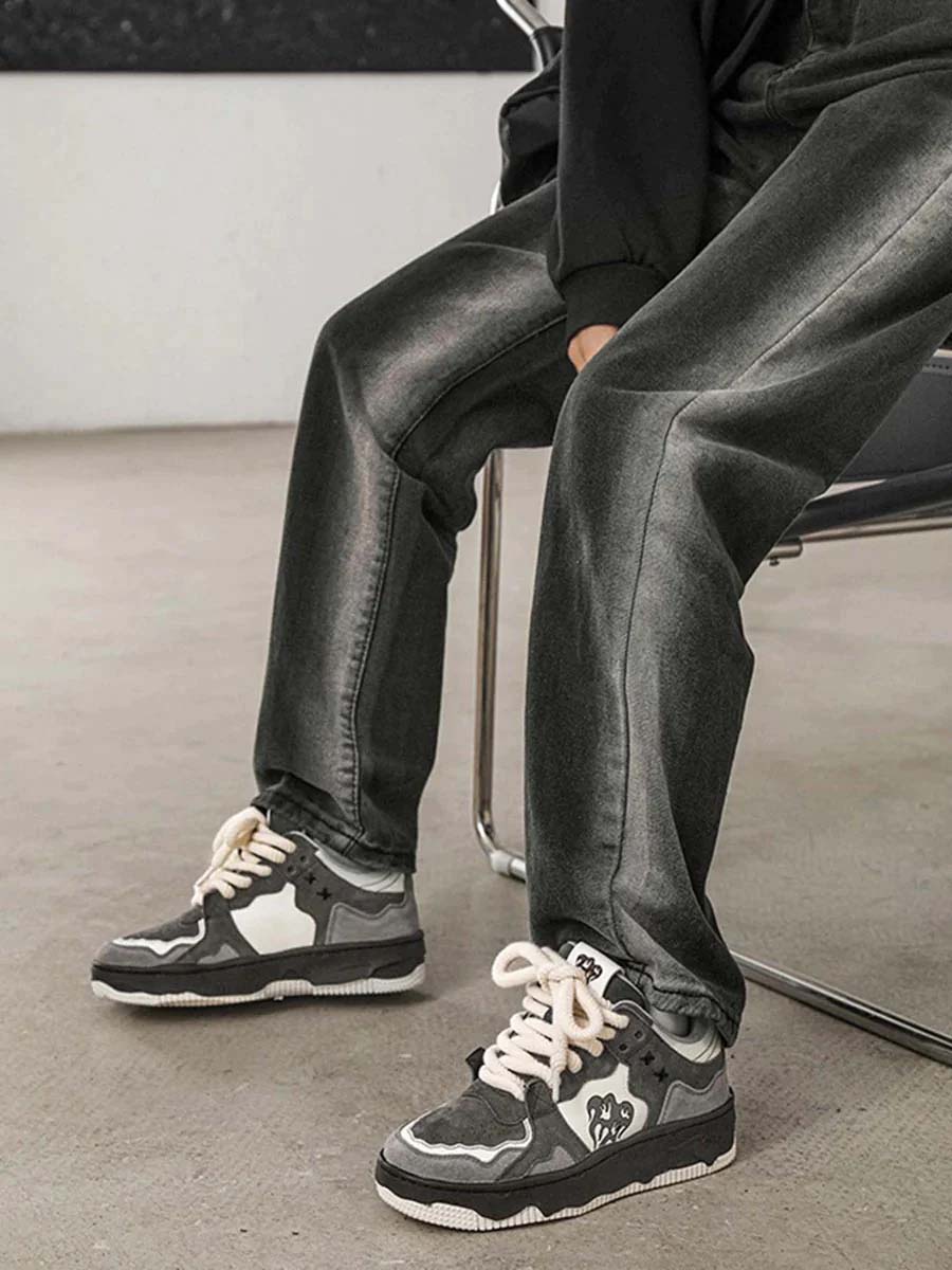 Frontansicht der Elian Vintage Herren Skateschuhe. Graue Retro Sneaker, bequem & klassisch für modebewusste Männer.