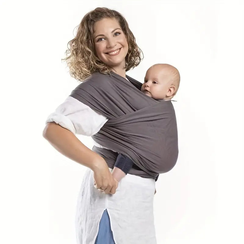 CuddleWrap Babytrage mit innovativer Rückenunterstützung für langes, komfortables & rückenschonendes Tragen.
