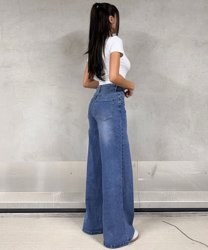 Dunkelblaue Damen Wide Leg Jeans, weites Bein. Ideal für trendige Freizeitmode & Komfort. Moderner Denim Casual Look.