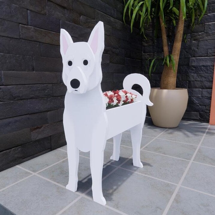 Hunde-Pflanzgefäß als stimmungsvolle Gartendeko, schafft gemütliche Atmosphäre.