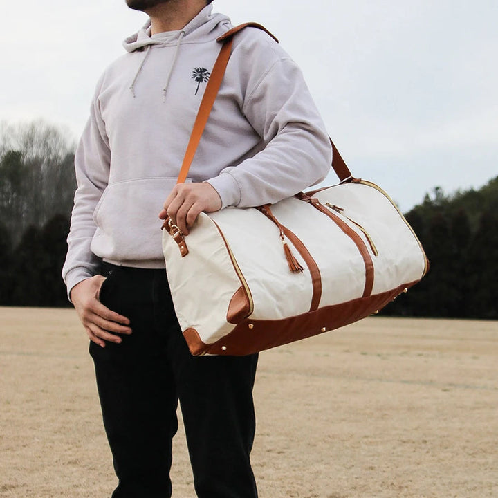 Kompakte, faltbare Reisetasche aus robustem PU-Leder, ideal als praktisches Reisegepäck.