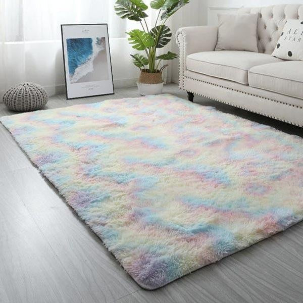 Dekorativer Regenbogen-Plüschteppich, flauschig & bunt, ideal für eine gemütliche Atmosphäre.