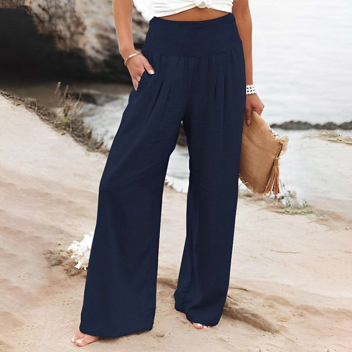 Elegante High Waist Wide Leg Hose für Damen. Moderne, bequeme Stoffhose mit weitem Bein, perfekt für den Sommer.