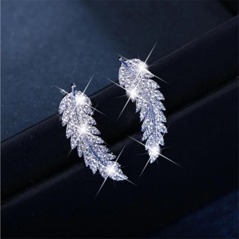 Zarte Damen-Engelsflügel-Ohrringe, symbolischer Schmuck. Elegant und spirituell, ein besonderes Geschenk.