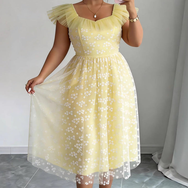 Festliches Damen Blütenkleid mit eleganten Tüllärmeln, ideal für Hochzeitsgäste und besondere Anlässe.