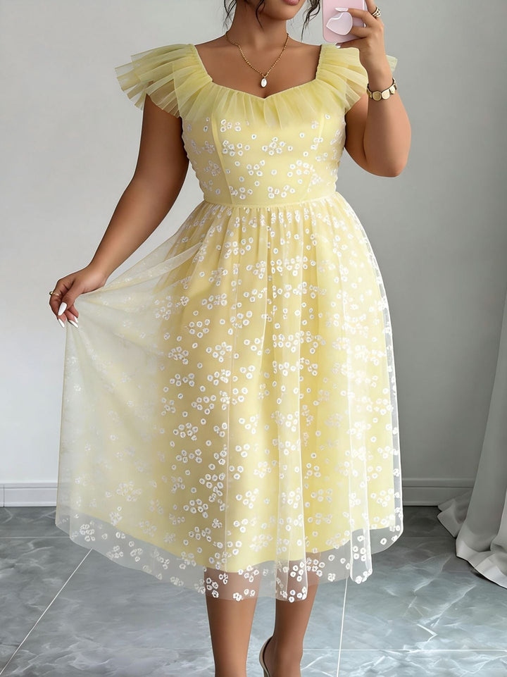 Exquisites gelbes Damen Blütenkleid mit detailreichen Tüllärmeln, passend für festliche Events und Abende.