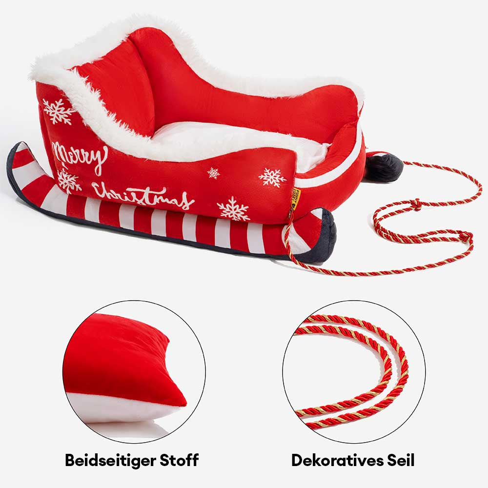 Plüschiges Hundebett "Weihnachtsschlitten", rot und braun, sorgt für festliche Gemütlichkeit beim Hund.