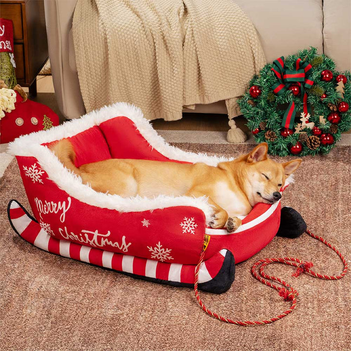 Luxuriöses Plüsch-Hundebett für Weihnachten, kuschelig und warm, im festlichen Schlittendesign für Hunde.